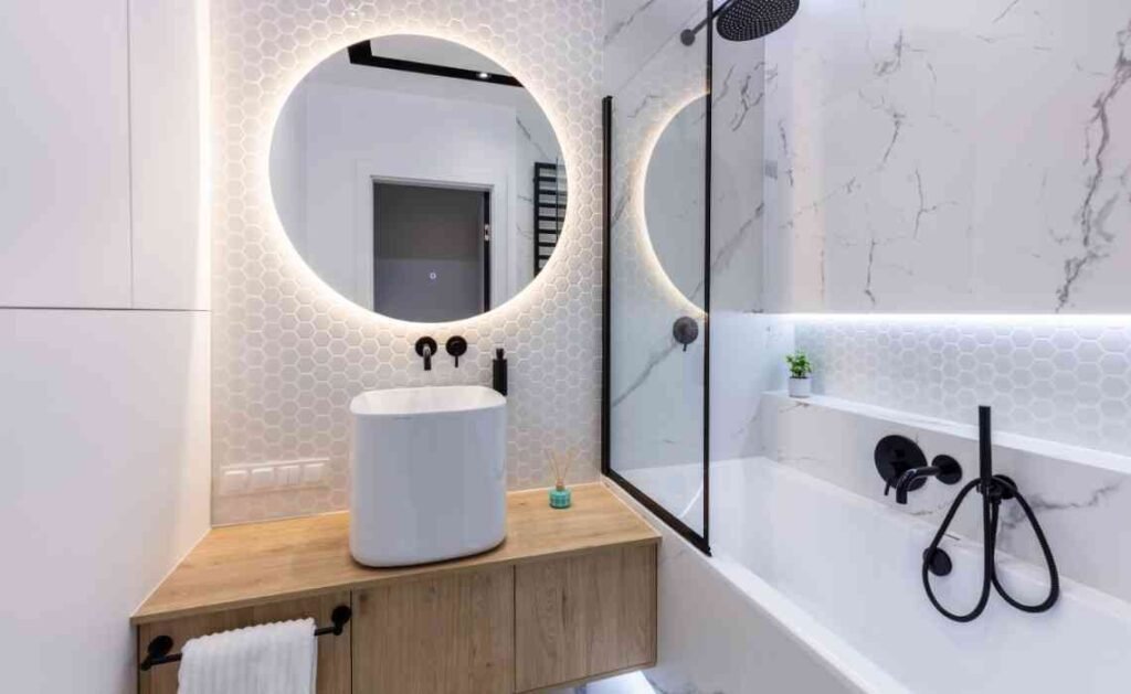 bathroom decor with round mirrors hightlighting the basin area