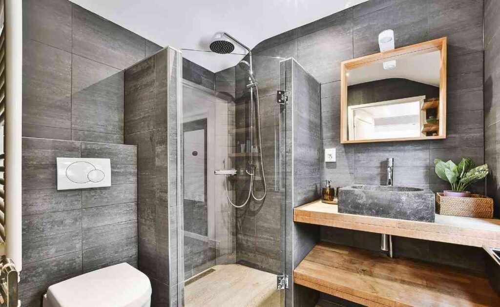 bathroom interior with grey and concrete finish