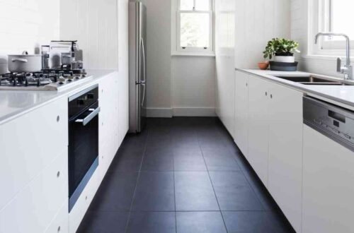 beautiful kitchen decor with black tiles and white finish