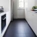 beautiful kitchen decor with black tiles and white finish