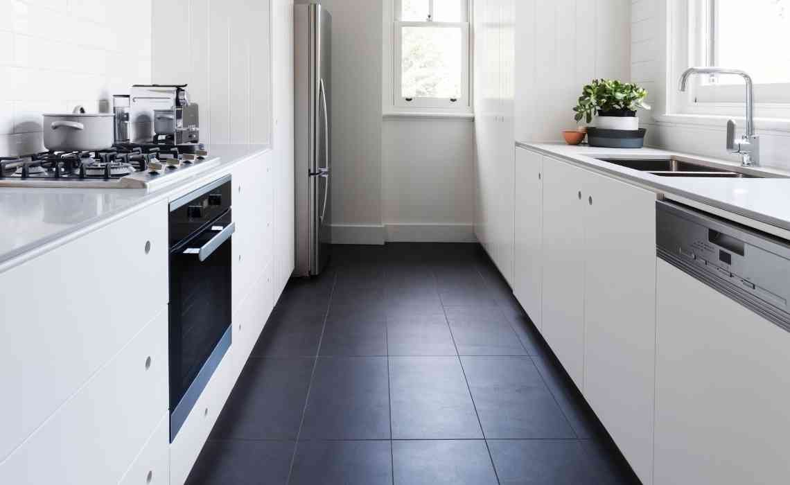 beautiful kitchen decor with black tiles and white finish